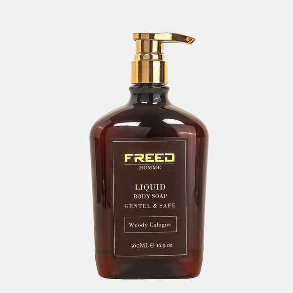 琥珀色玻璃瓶,金色壓頭,正面特寫,FREED客製化刻字。